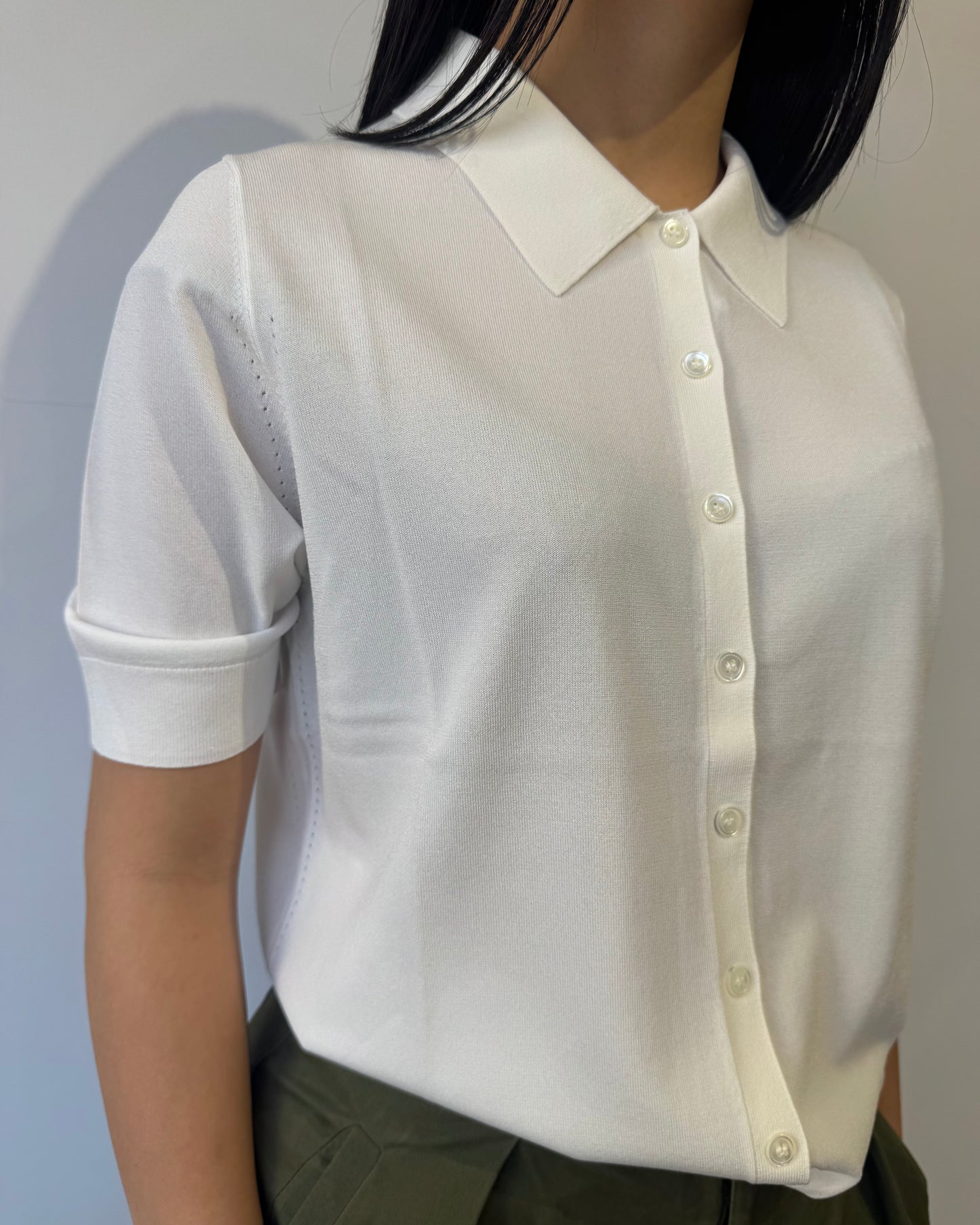 Polo bottoni viscosa bianca