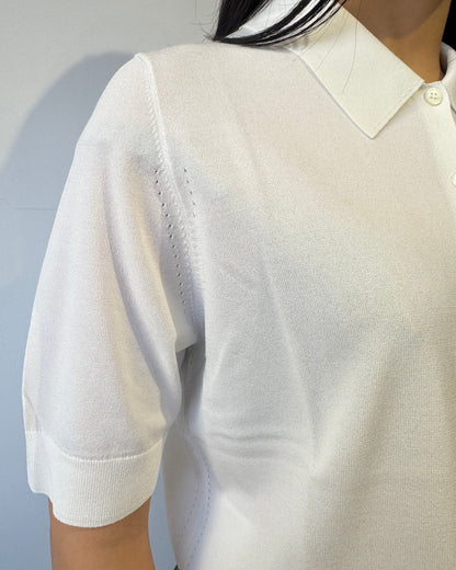 Polo bottoni viscosa bianca
