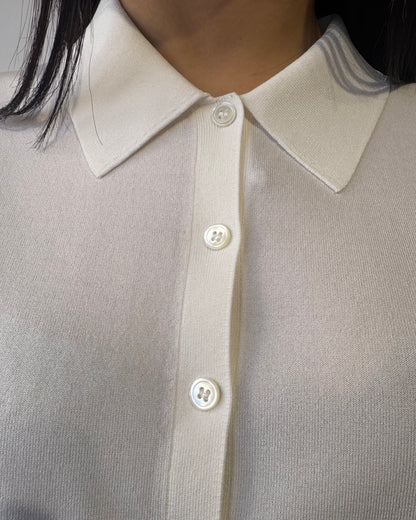 Polo bottoni viscosa bianca